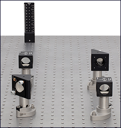 RBP1 and RBP Pin-Aligned, Clamping Post Bases used with KCB1 Right-Angle Kinematic Mirror Mounts and CCM1-PBS251 Cage Cube-Mounted Polarizing Beamsplitter Cubes , and BHM1 Ruler for alignment of an Interferometer above holes in the table